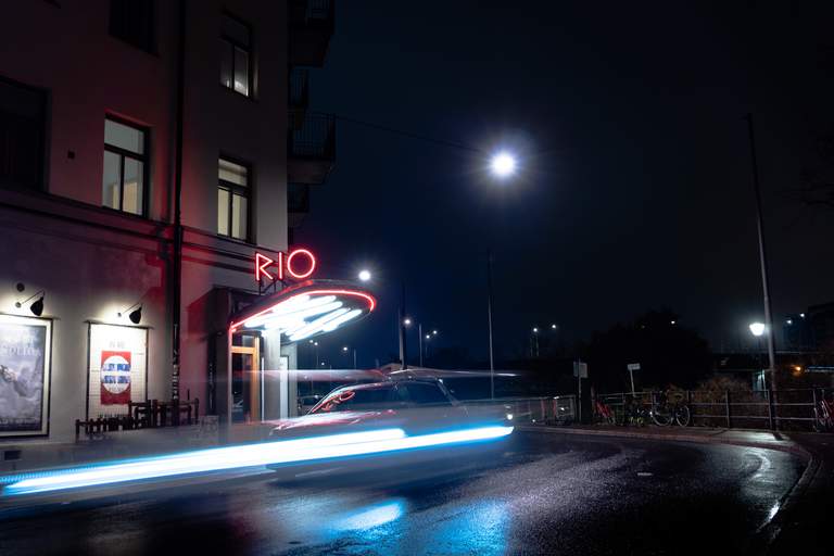 Neon lights outside of Bio Rio retro cinema at night in Stockholm