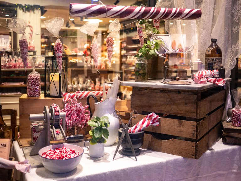 Christmas window display of red and white candy at Gamla stans polkagriskokeri in Stockholm.