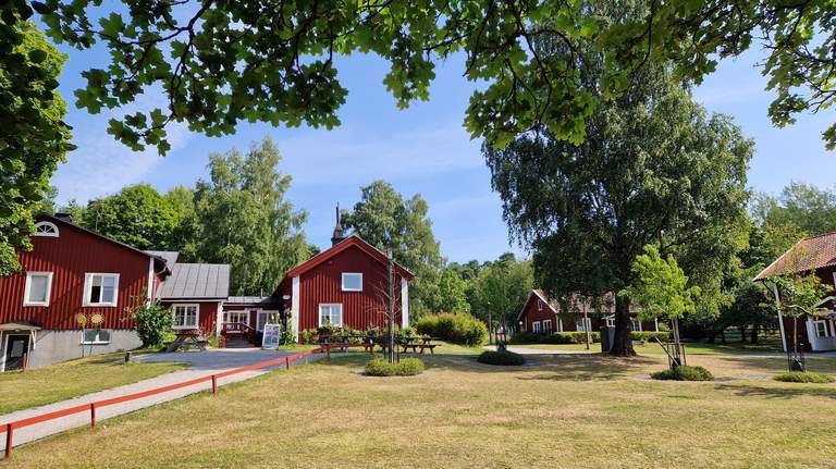 Parks in Stockholm. Old farmhouses in Husbygårdsparken in the northern suburb Husby.