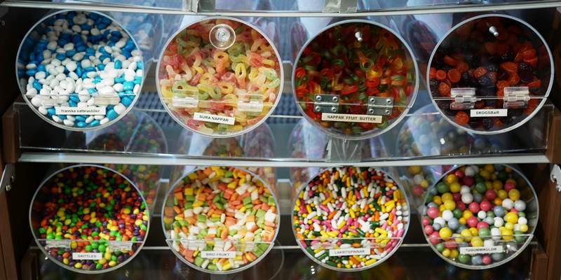 Shopping in Stockholm. Jars of colorful candy in Caramella, a candy store at Hötorget.