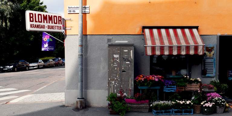 Storfront on a quiet street in Midsommarkransen, a suburb west of Södermalm in Stockholm. In the early years of the 21st century the area transformed from run-down to trendy, with lots of cafes and boutiques opening up.