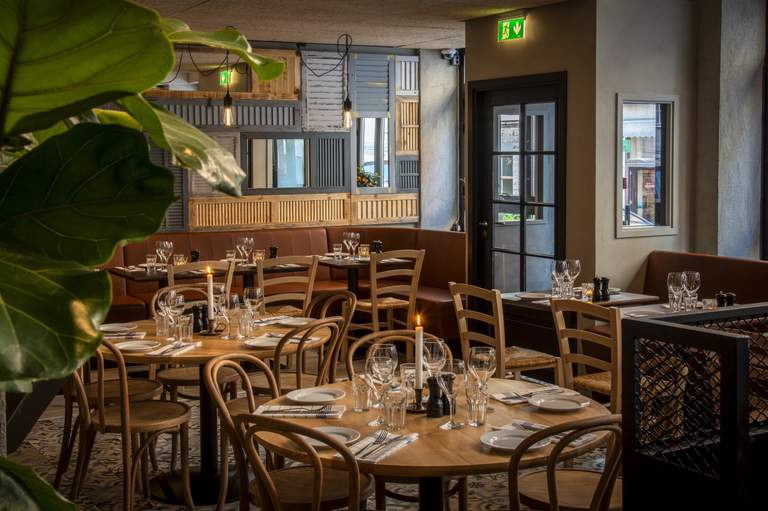 Empty interior of the Greek restaurant Esperia in Stockholm.