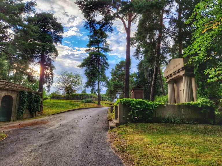 The Northern Cemetery: a path, trees, grass.