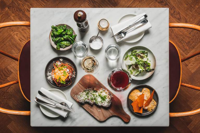 Restaurants in Stockholm. A table set with tapas dishes at Las Brasas in Stockholm.