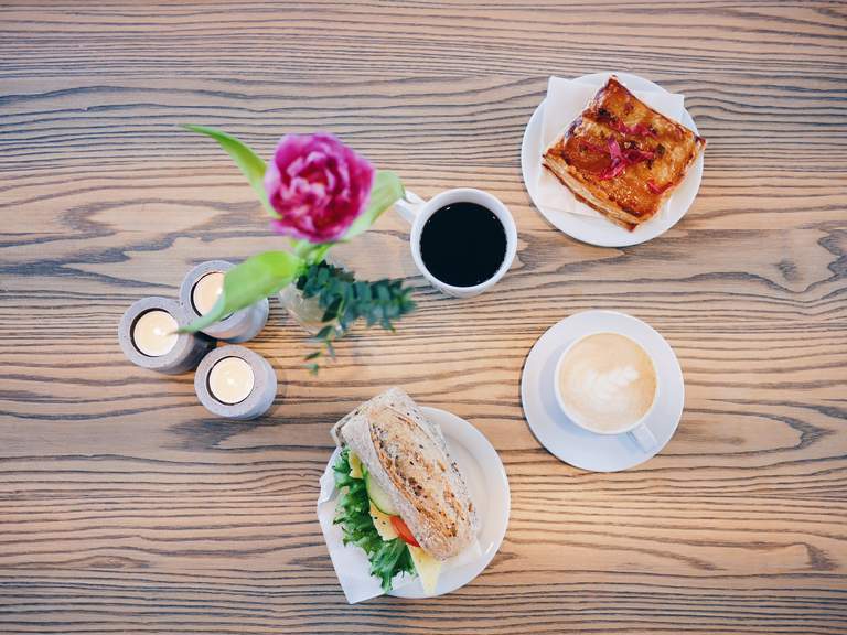 Cafées in Stockholm. A table set for fika at Fosch on Östermalm.