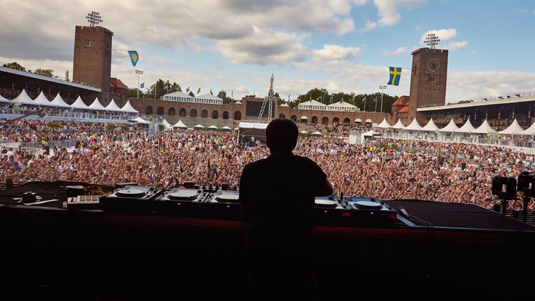 Music in Stockholm. DJ performing live at Stockholm's Olympic Stadium.