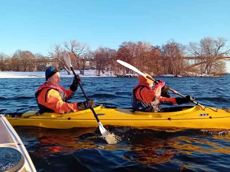 Two people in a kayak.