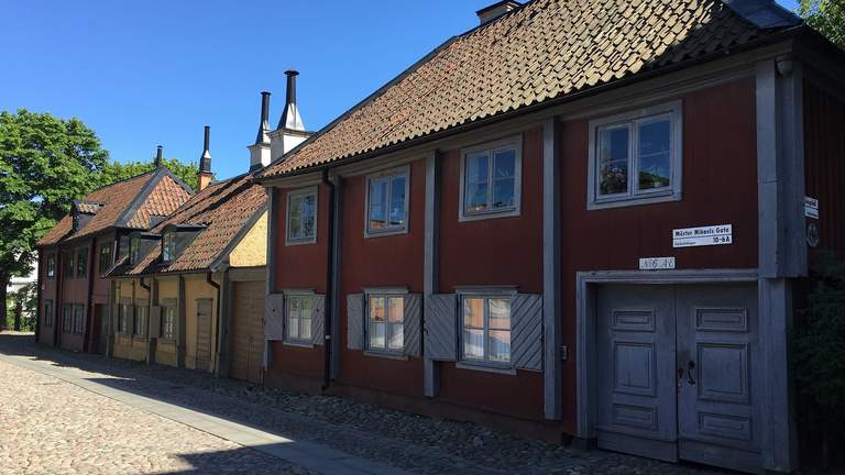 A street with old wooden houses.