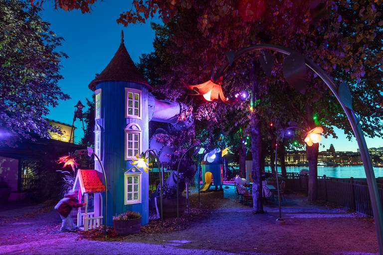 A brightly colored playground with a Moomin theme