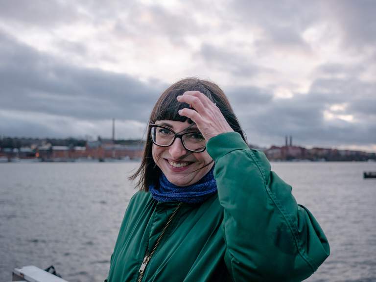 Portrait of Stockholm local Ingalill Massiani onboard the commuter ferry towards Tappström.