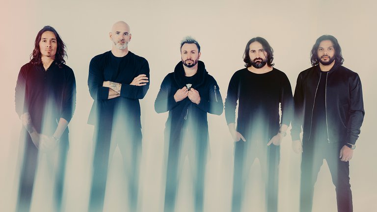 Photo of the band Periphery in black clothes.