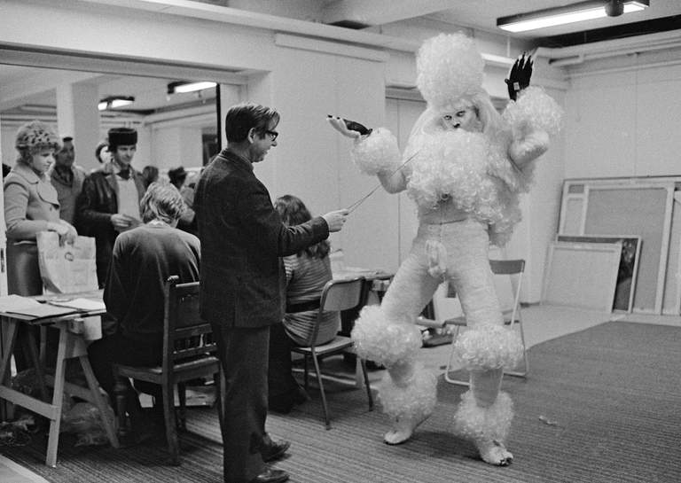 Kjartan Slettemark in her poodle suit at Vårsalongen in 1975.