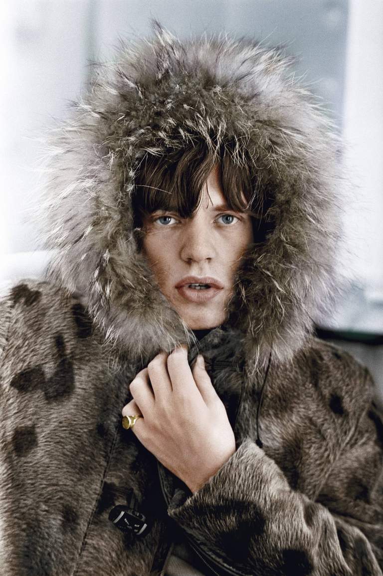 Photo of Mick Jagger in a fur coat.