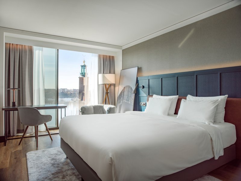 Modern guest room with waterfront view