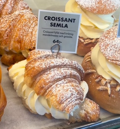 Different, creative semla varieties on display in a bakery