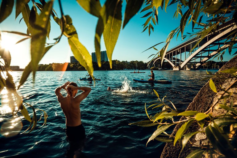 Friends swimming in Stockholm