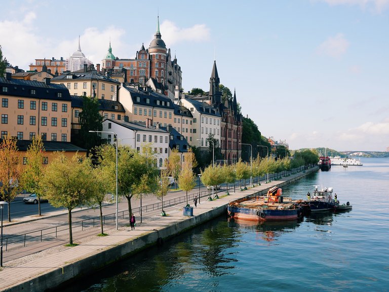 A scenic view over the Söder Mälarstrand waterfront and Mariaberget neighborhood in Stockholm's Södermalm district.