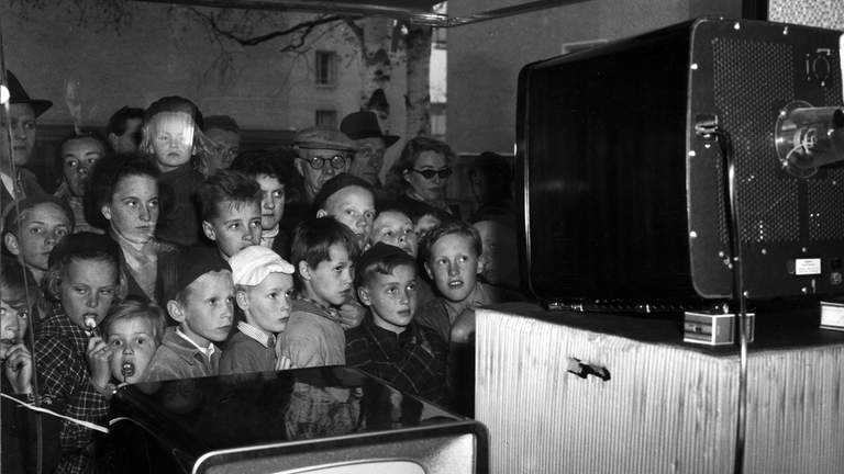 Children watching TV.