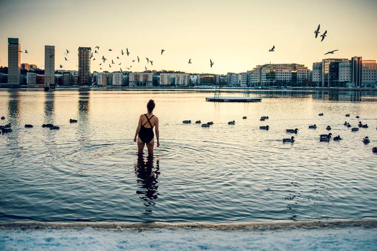 A woman winter bathing in Stockholm, Södermalm