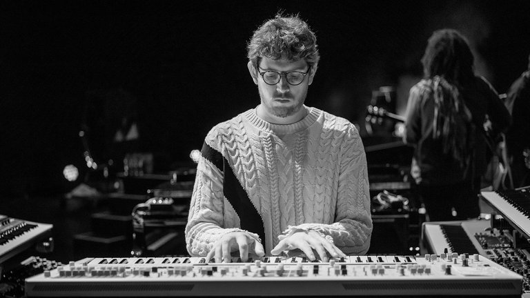 The musician Elijah Fox playing his musical instrument.