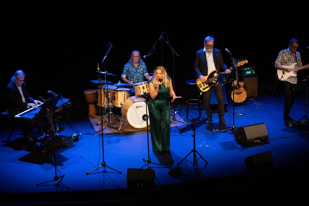 Musicians performing on a stage