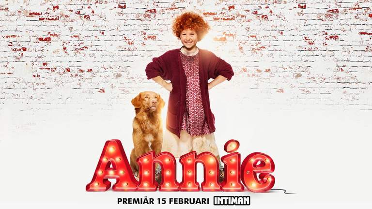 A girl and a dog from the musical Annie.