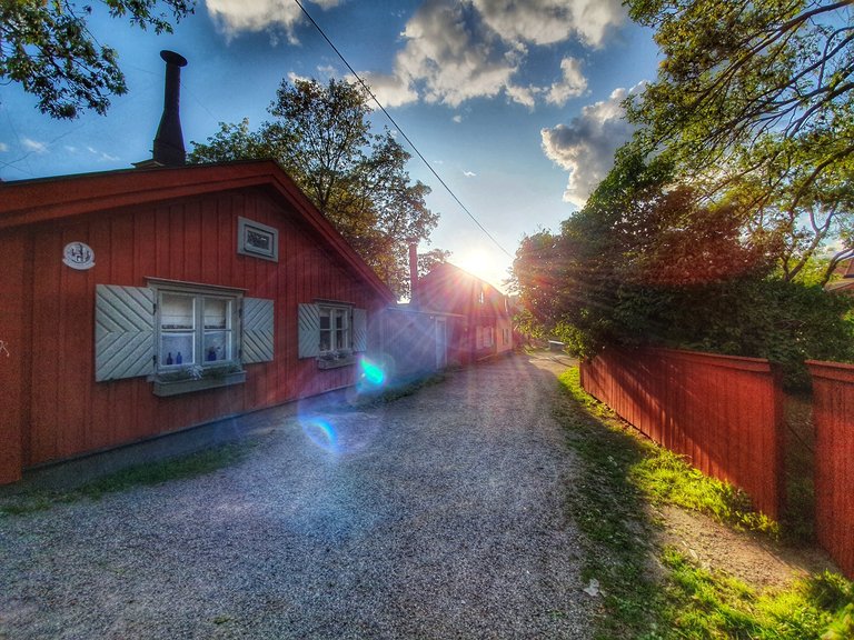 wooden brown house and fence