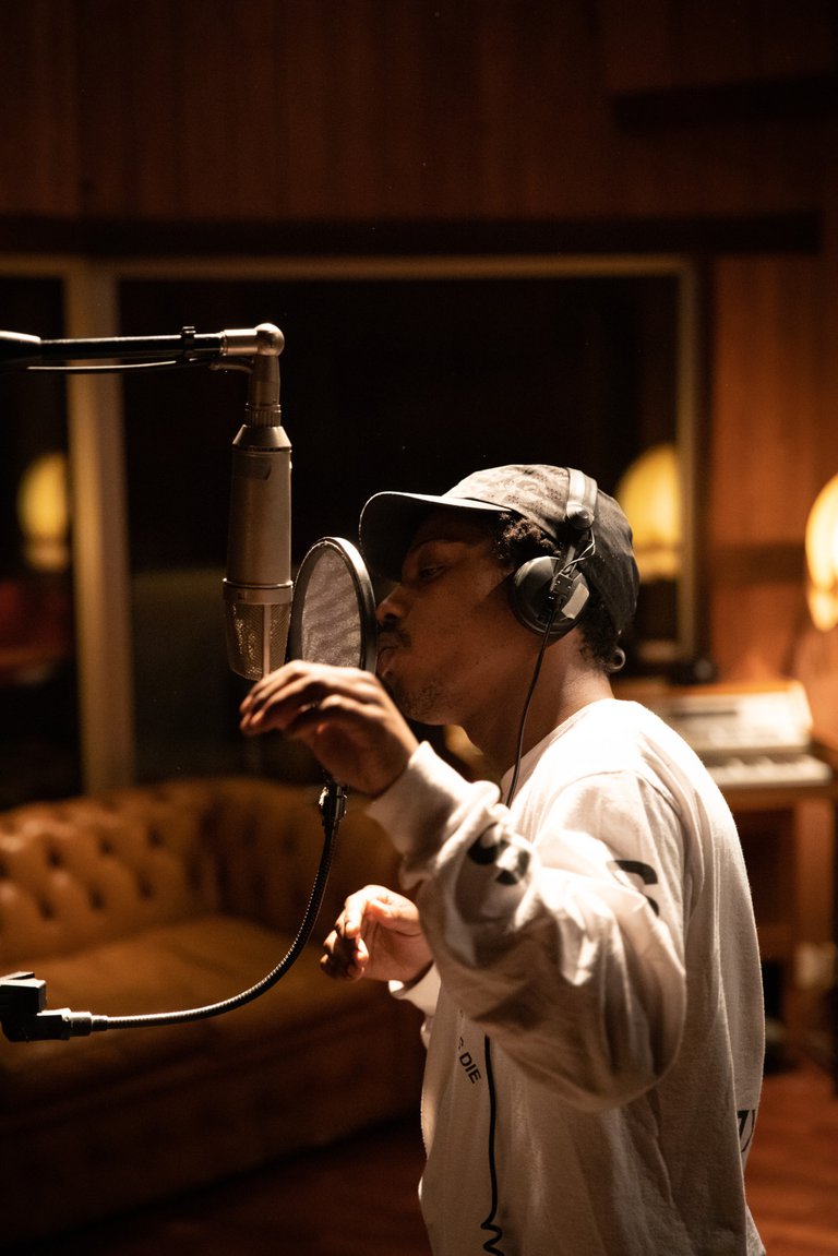 Musician creating music in a studio in Stockholm.