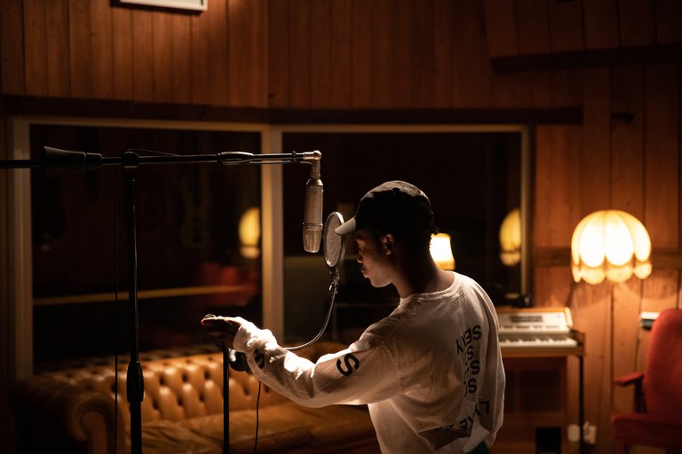 Musician creating music in a studio in Stockholm.