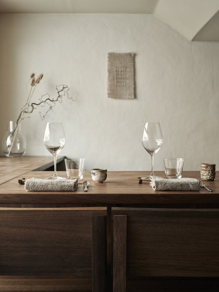 Interior of Dashi, a Japanese restaurant in Stockholm. Minimalistic interior and muted earthy colors.