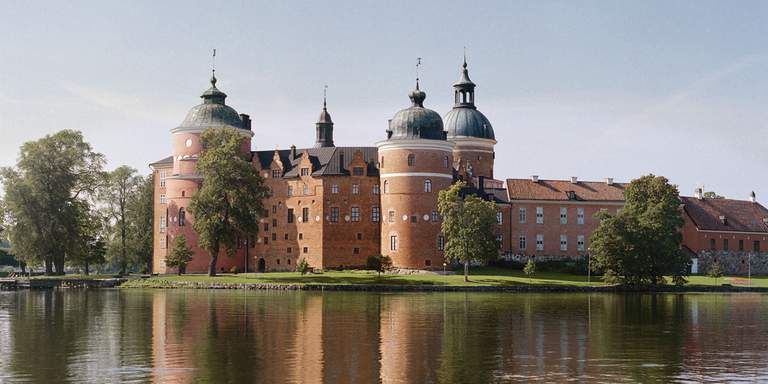 Outside view of Gripsholm Castle, in Mariedfred a picturesque town on Lake Mälaren just north of Stockholm. This renaissance castle is a popular tourist attraction and offers romantic grounds, a fallow deer nature reserve and collections of furniture, handicrafts, and interiors from four centuries.