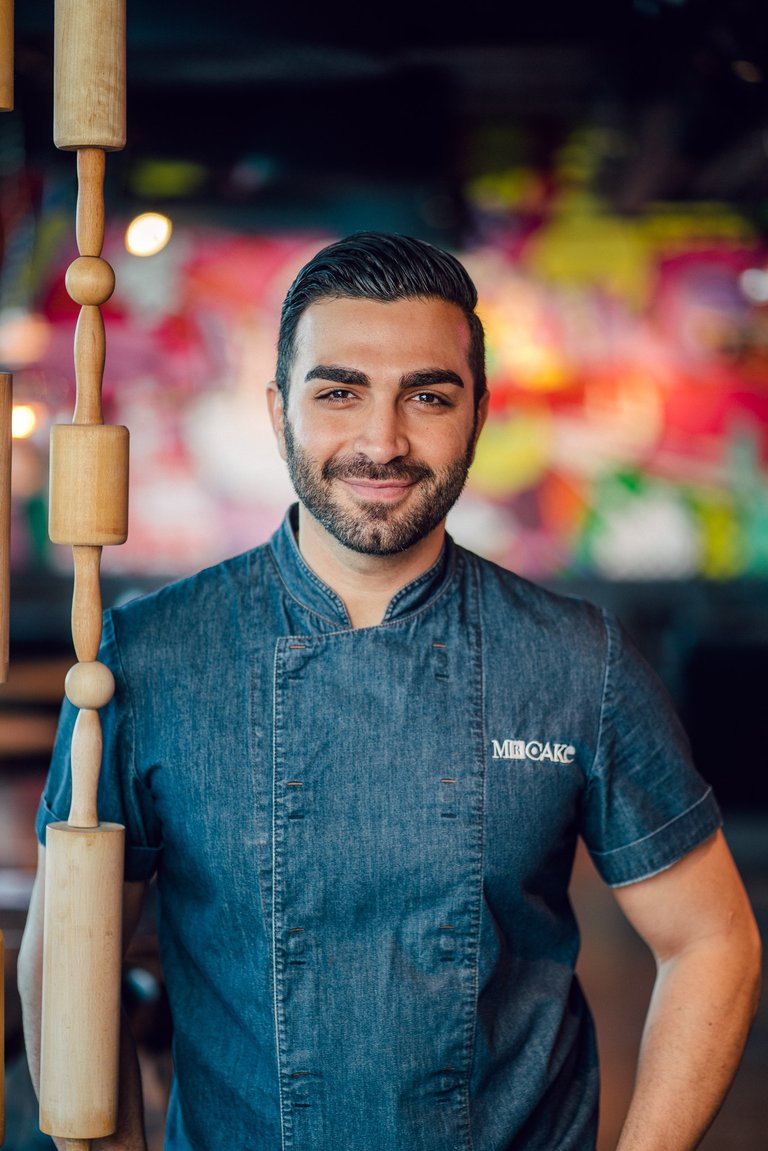Swedish pastry chef, author and tv-personality Roy Fares, staniding in his café Mr. Cake.