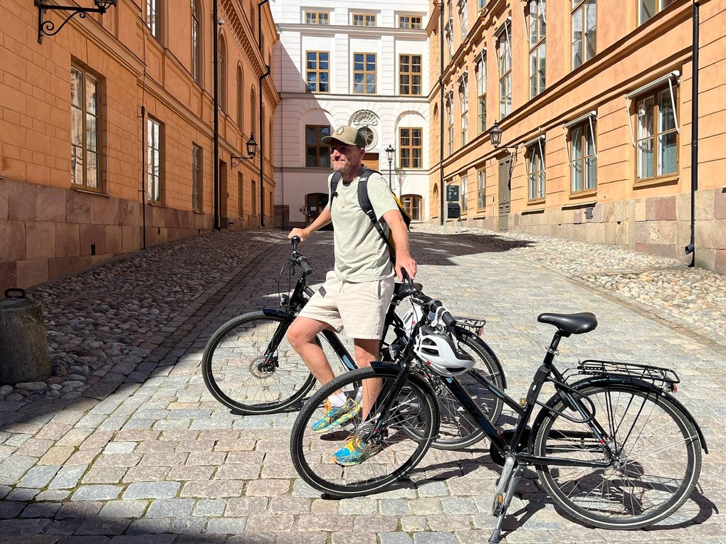 person with two bikes