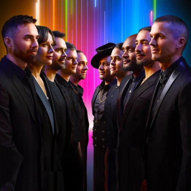 two lines of artists standing facing eachother