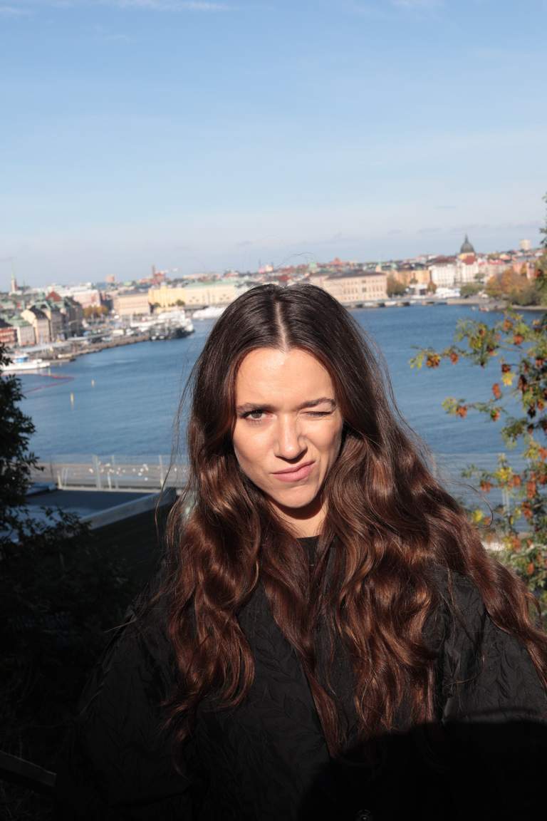 Melissa Horn with a view over Stockholm as a background.