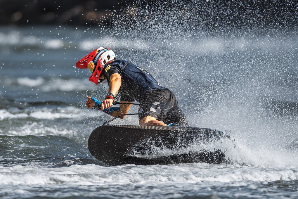 A MotoSurf rider racing at high speed on the water during the MotoSurf World Championship in Stockholm