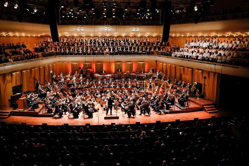 An orchestra on a stage.