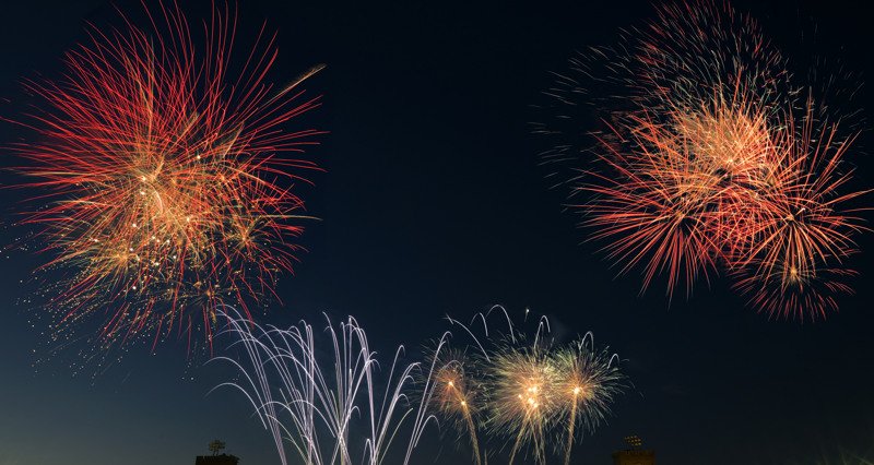 Various fireworks lighting up the sky.
