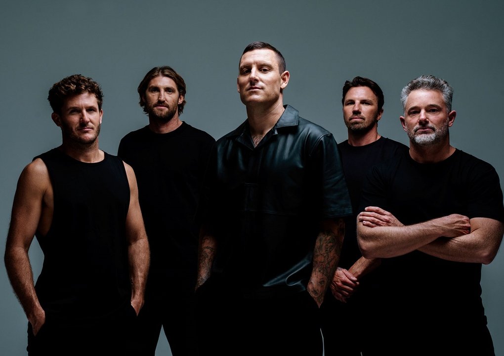 Five men in black clothing.