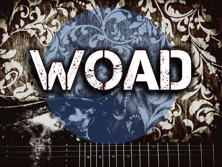 The word "Woad" with flower pattern in the background.