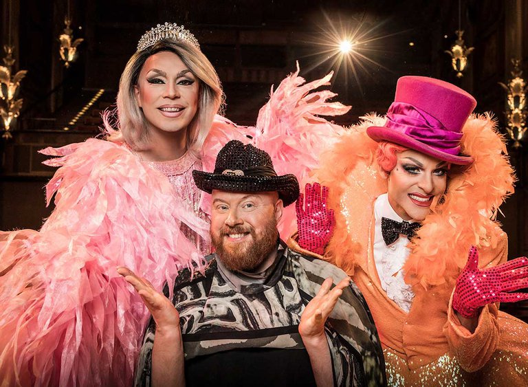 Performers in stage costumes.