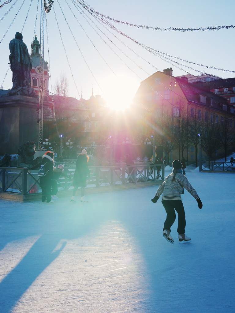 An ice skater in the ice rink in Kungsträdgården park