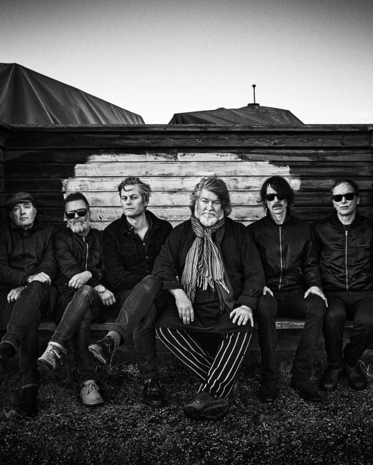 A black-and-white photo of the band The Soundtrack of Our Lives
