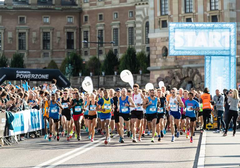 Races in Stockholm. Runners jog at the starting linel of Stockholm Half-Marathon.