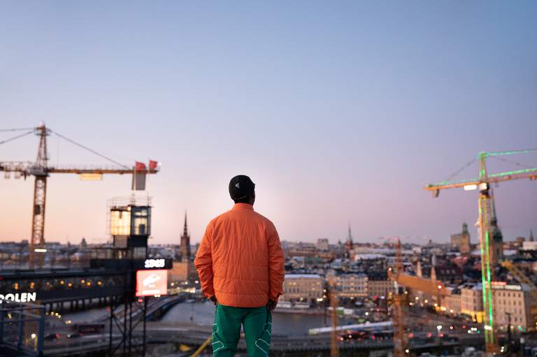 A man looks out over Stockholm from a vantage point on the island of Södermalm.