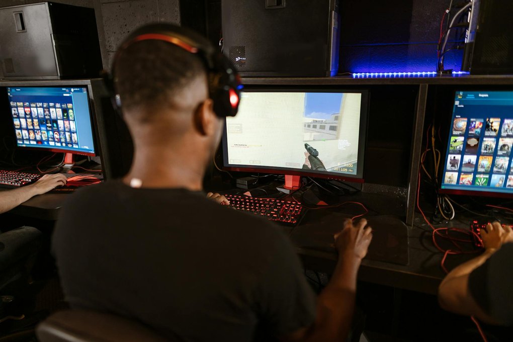 A person playing Counter-Strike on a computer.