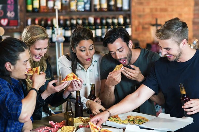 people eating pizza