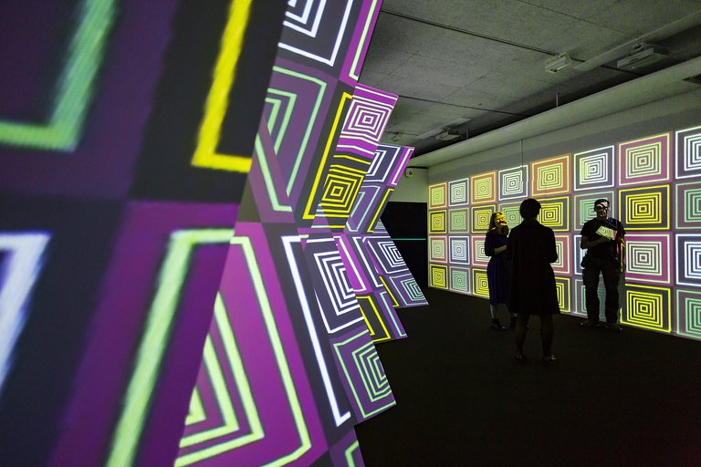 Digital screens with colorful patterns at the Technical Museum in Stockholm