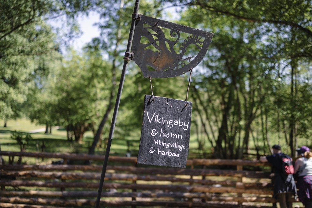 A sign with the words: Viking village & harbour.