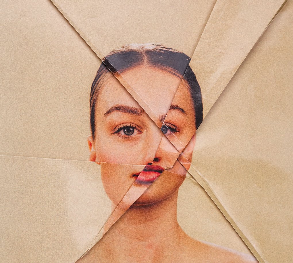 Poster image for Folkoperan’s “Tosca”: close-up collage portrait of a woman, assembled from folded beige paper.